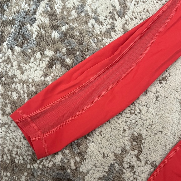 Perfect condition size 2.  Pumpkin orange color. Lululemon leggings. - Picture 4 of 7